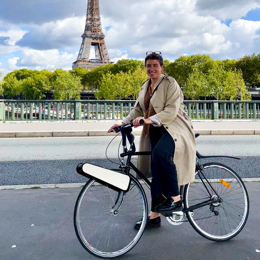 Rider with CLIP in Paris, the Eiffel Tower behind