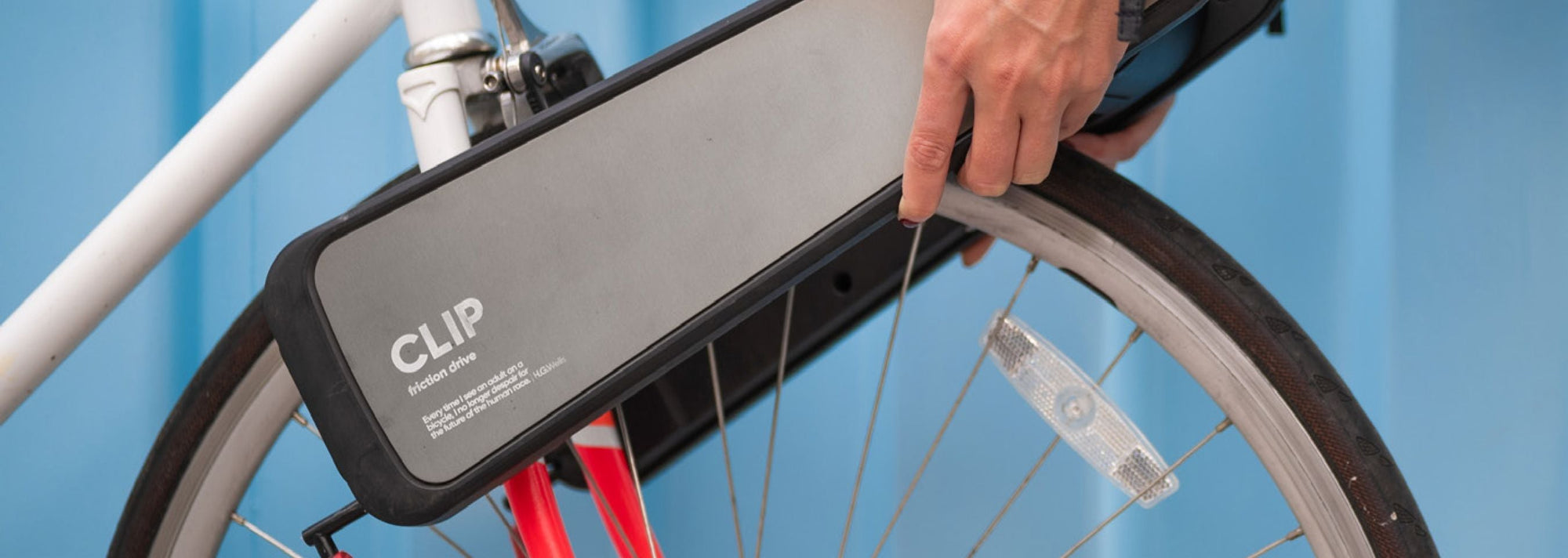 CLIP clamped onto the front fork of a city bike